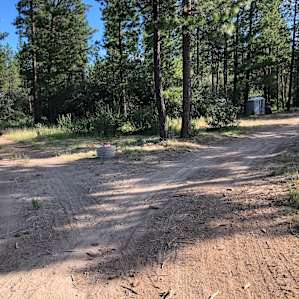 Dirt road from the shower/portable restroom to the tent sites.