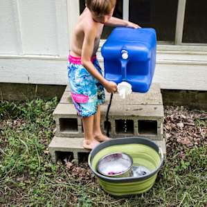 The host left us plenty of these full large blue water buckets for multi use.