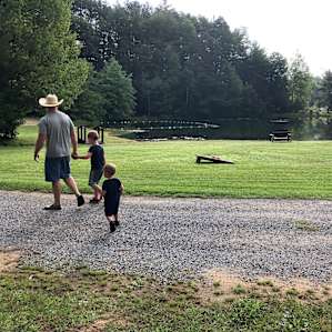 Lovely pond with fun backyard games!