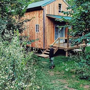 The cabin is surrounded by beautiful forest