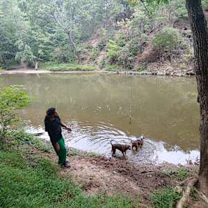 Doing a little fishing at the swimming hole