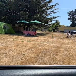 Our campsite was right up front, easy to find, he provided umbrellas and picnic table cloths too!
