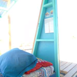 enjoy the comfort of a bohemian loft and shelter from the sun, while taking in cool breezes and mountain views!