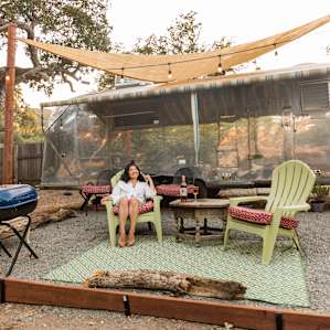 4 chairs in front of airstream