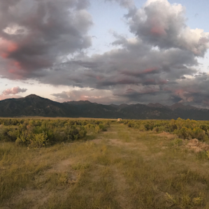Another panoramic of the mountain view with colorful sky
