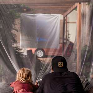Enjoy a movie with the family from the pergola.