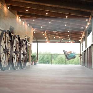 The porch wraps all around the house and has plenty of benches, swings, and comfy chairs