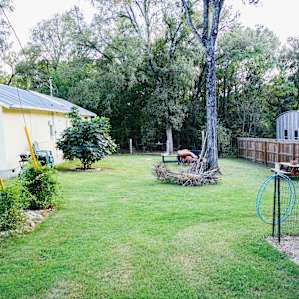 Host's home - the campsite is directly behind the home in the woods.