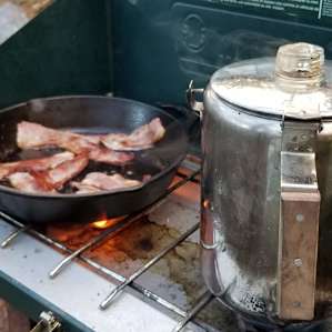 Our hosts have even outfitted the site with a Coleman stove - and many other useful items. This was so handy when our firewood was wet due to an evening downpour, but we had the essentials of life - coffee and bacon! :-)