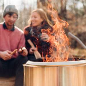 people campfire winter