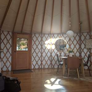 The inside is filled with so much light and fresh flowers and plants everywhere