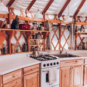 Beautifully crafted kitchen area that is super well stocked and clean. Tea, coffee, pasta, a gas stove, lots more!