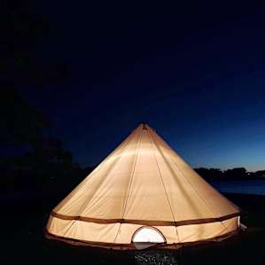You can rent a yurt for a small fee and during the cold season a space heater will be sure to make you feel more comfy at night.