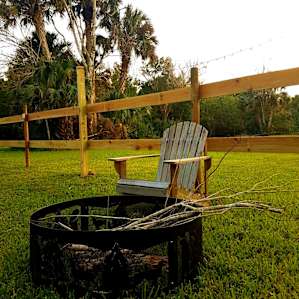 Each of the two designated camp spots is set up with a crafted metal fire pit & timber chairs