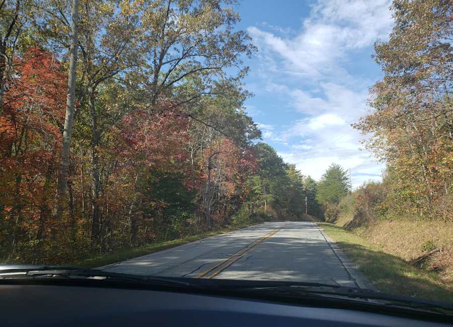 Mountain valley glowing with fall color near Linville Adventure Pasture in North Carolina