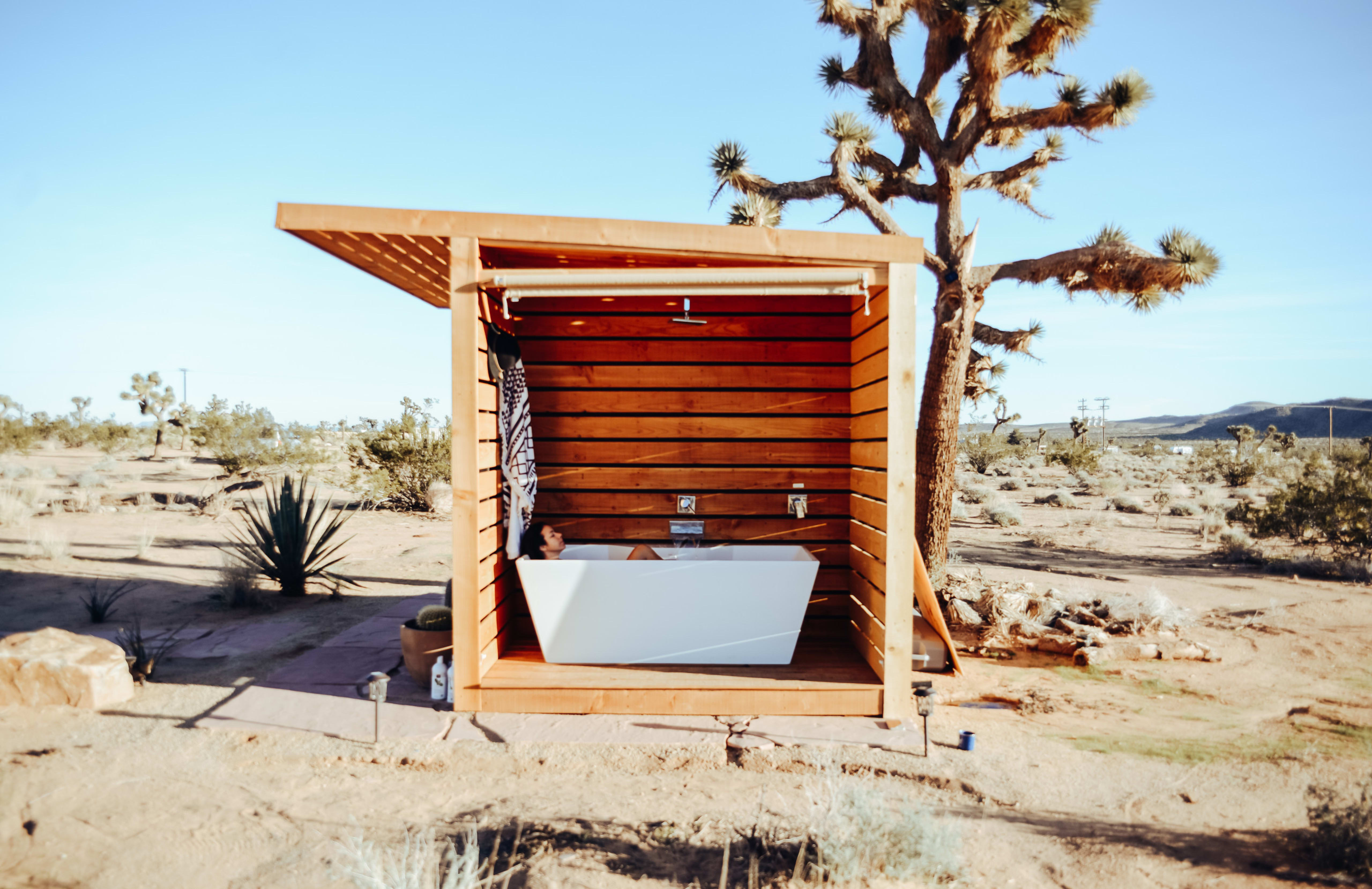 A gorgeous bathtub and shower at a Joshua Tree campsite on Hipcamp